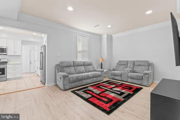 a living room with furniture and a couch