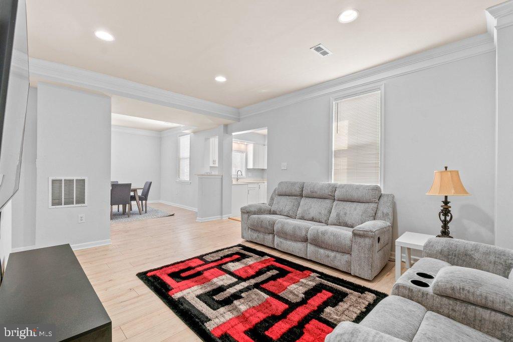 4919 Harford Road Baltimore, MD 21214 - Photo 10 of 48 a living room with furniture and a couch