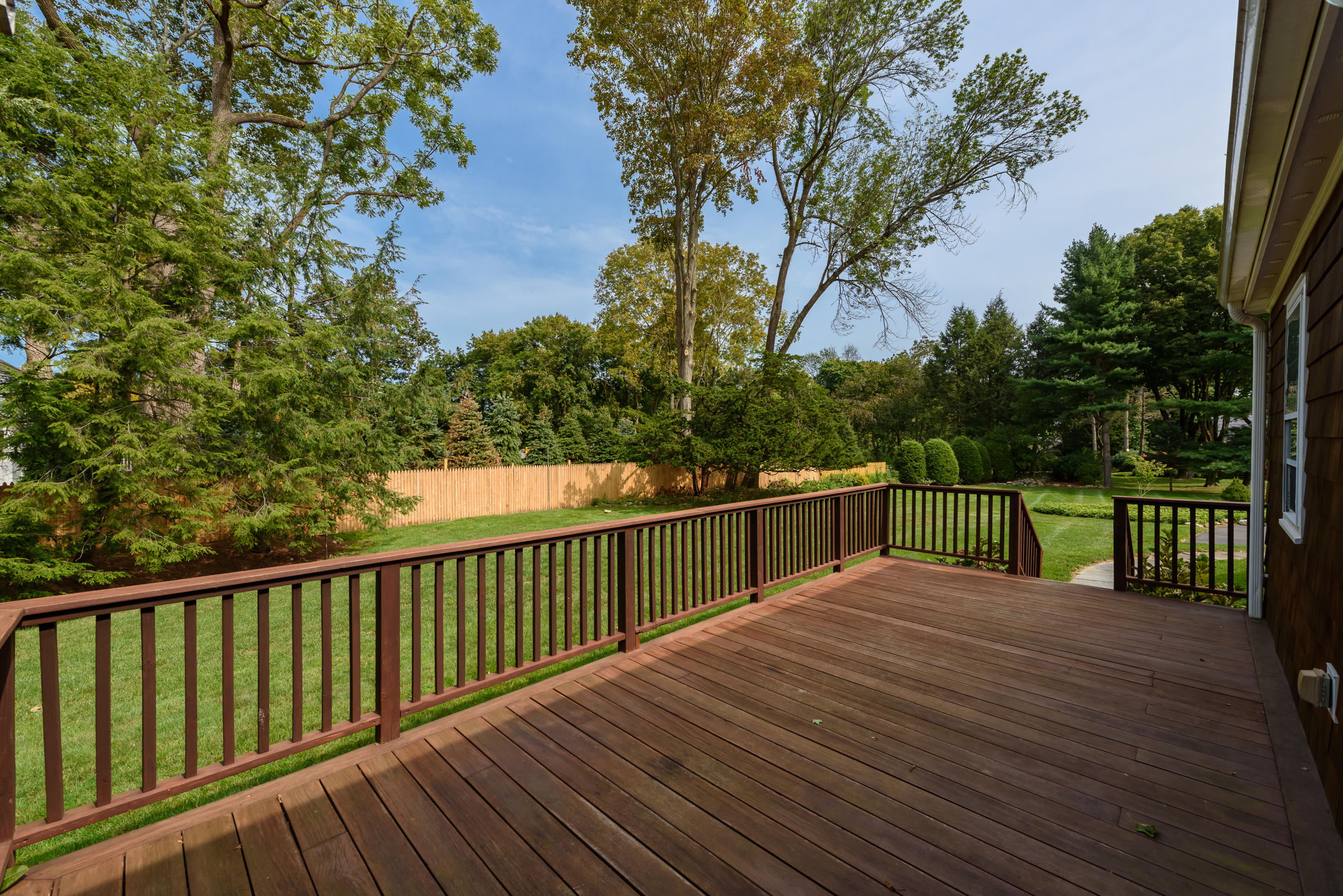 12 Lynam Road Stamford, CT 06903 - Photo 18 of 21 a view of balcony with deck and trees