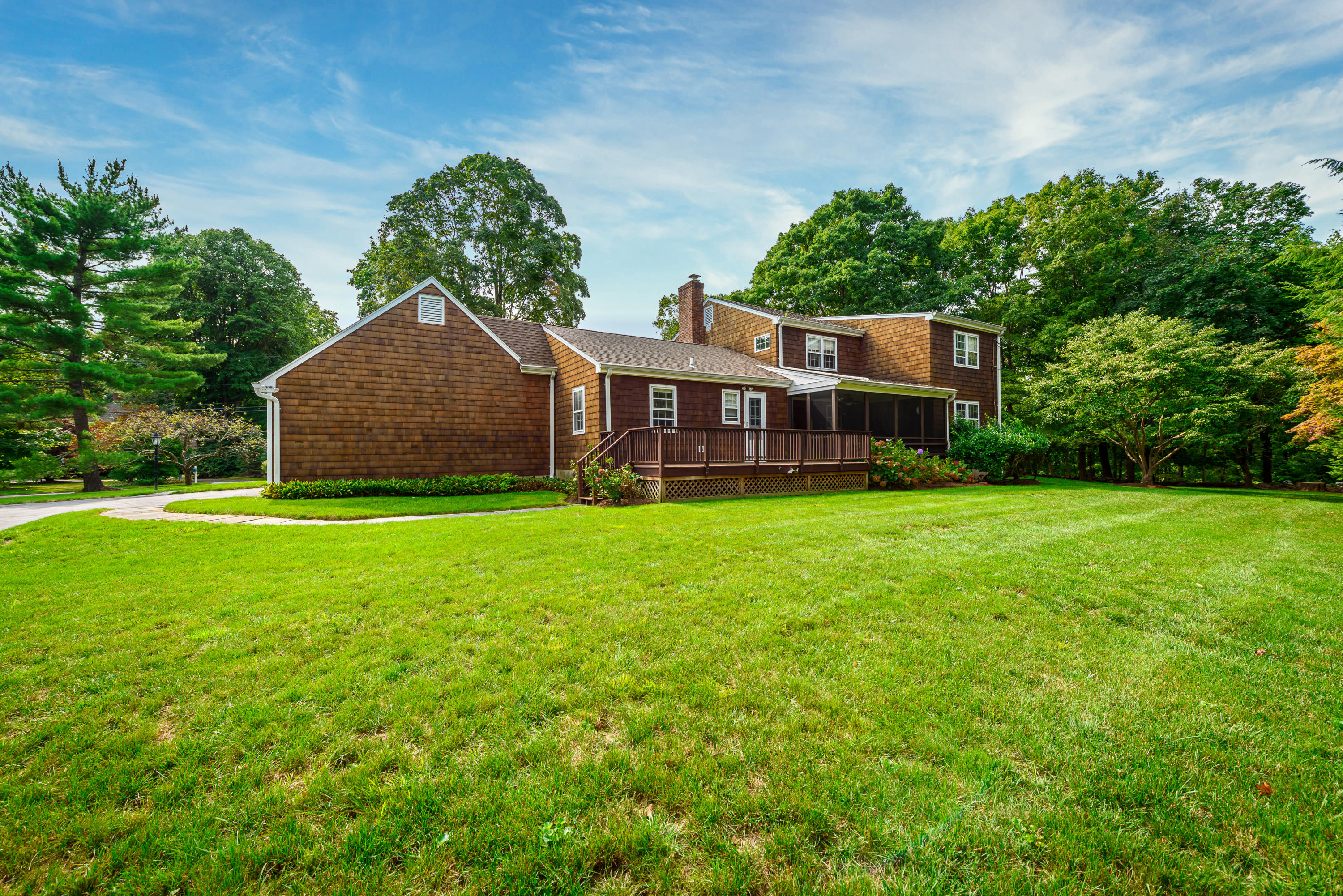 12 Lynam Road Stamford, CT 06903 - Photo 20 of 21 a front view of house with yard and green space