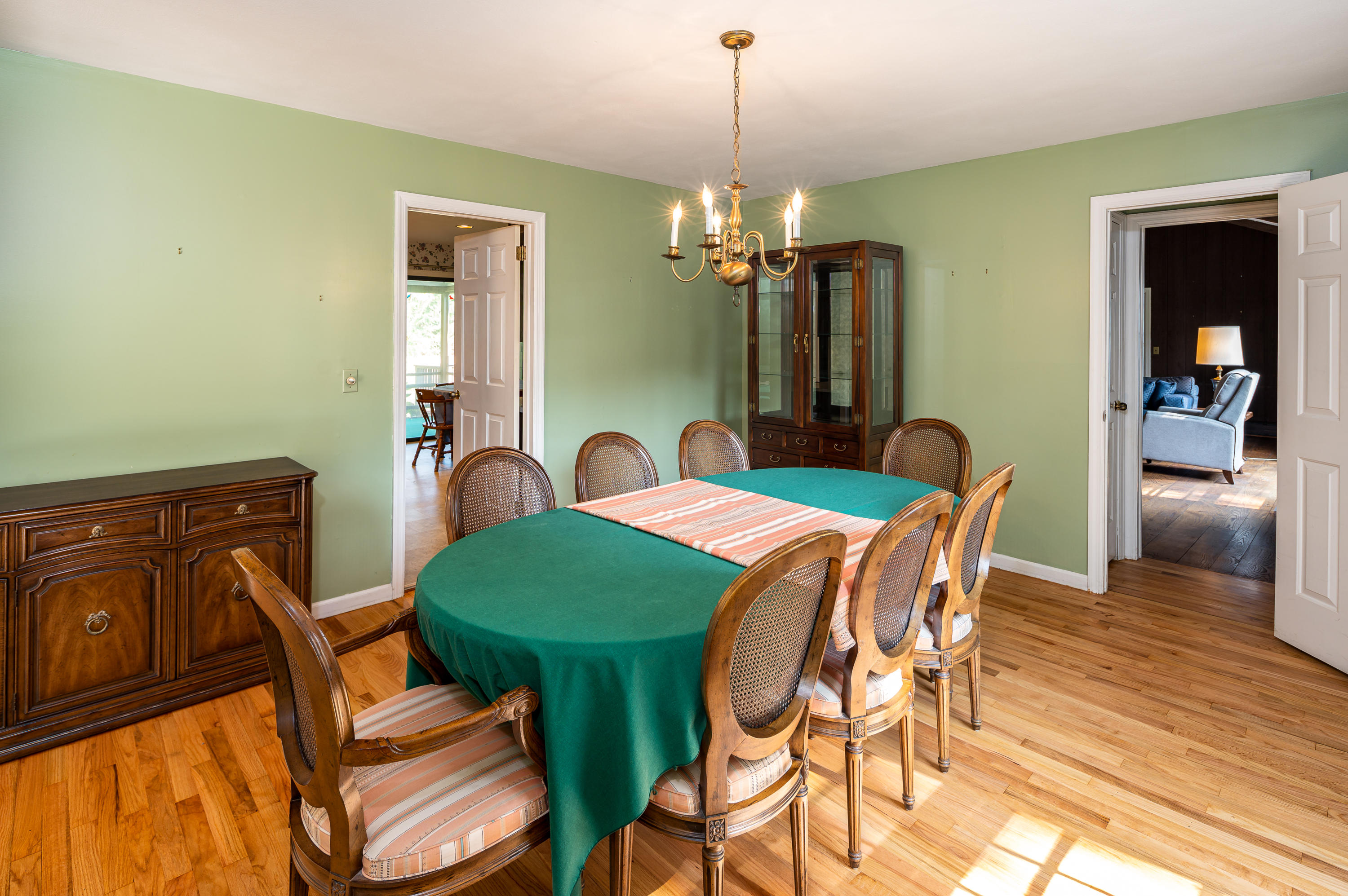 12 Lynam Road Stamford, CT 06903 - Photo 6 of 21 a view of a dining room with furniture and chandelier