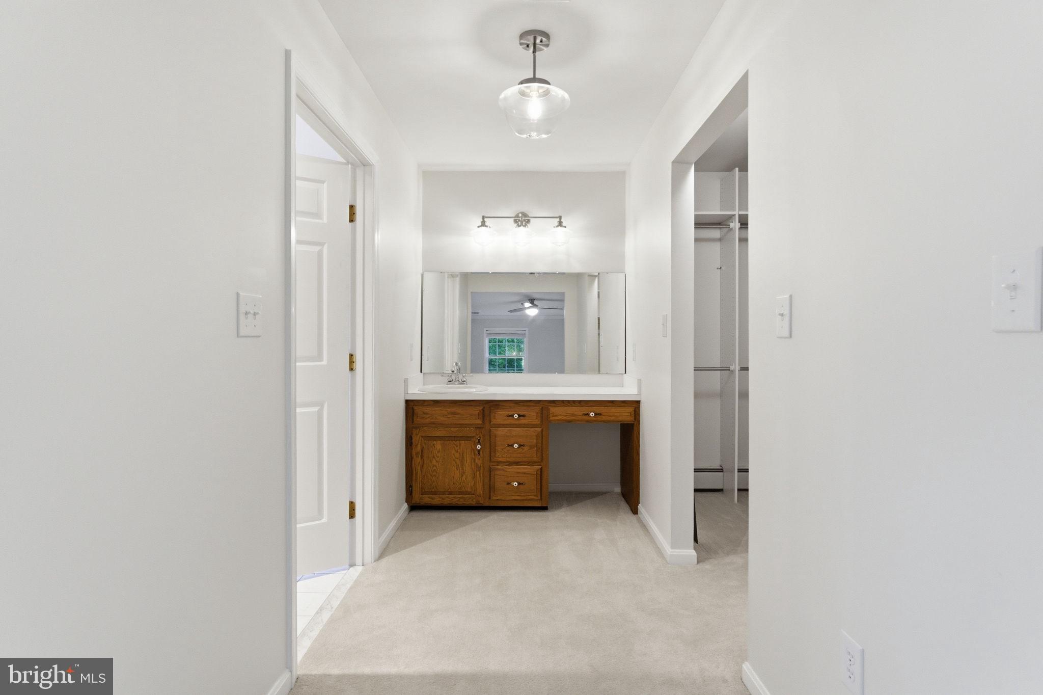 6040 Southgate Farm Road Indian Head, MD 20640 - Photo 55 of 94 Bright and inviting bathroom hallway.