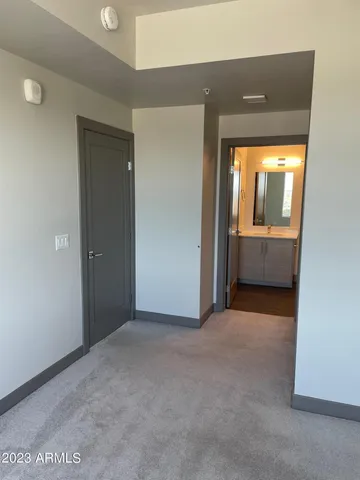 an empty room with a bathroom