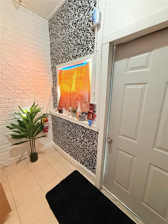 1709 18th Avenue South, Unit 1 St. Petersburg, FL 33712 - Photo 4 of 8 a view of entryway with wooden floor