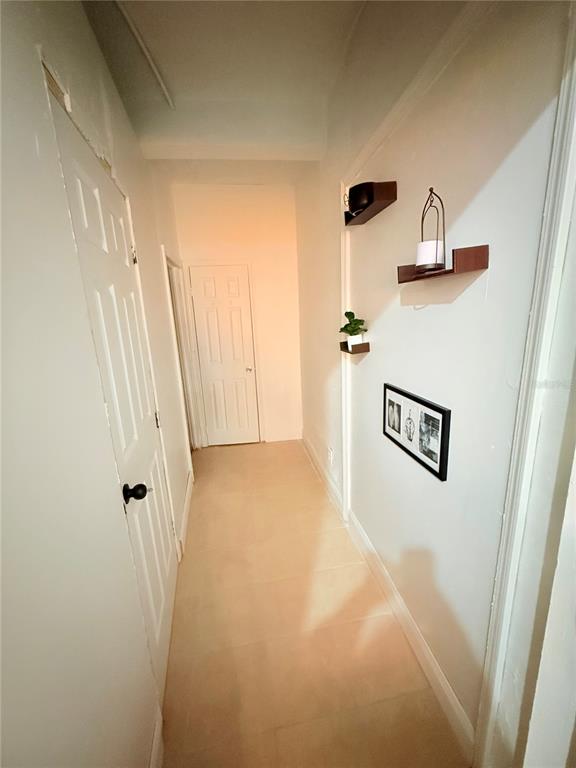 1709 18th Avenue South, Unit 1 St. Petersburg, FL 33712 - Photo 5 of 8 a view of a hallway with closet