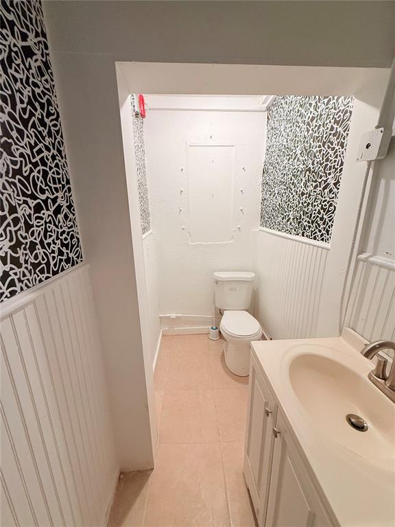 1709 18th Avenue South, Unit 1 St. Petersburg, FL 33712 - Photo 7 of 8 a bathroom with a sink toilet and shower