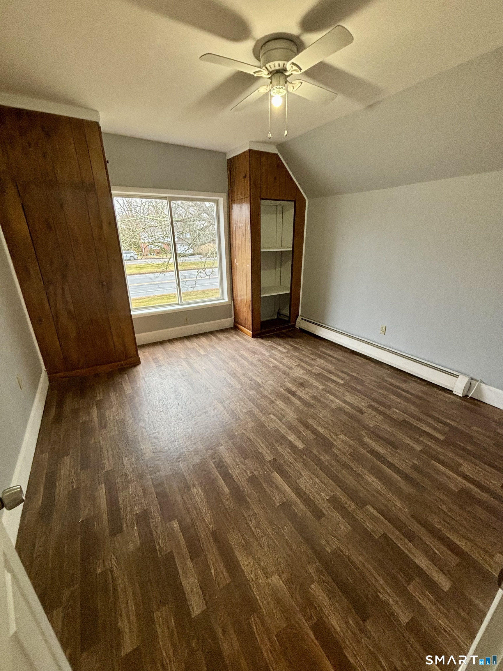 411 Main Street, Unit 1 Cromwell, CT 06416 - Photo 15 of 15 wooden floor in an empty room with a window