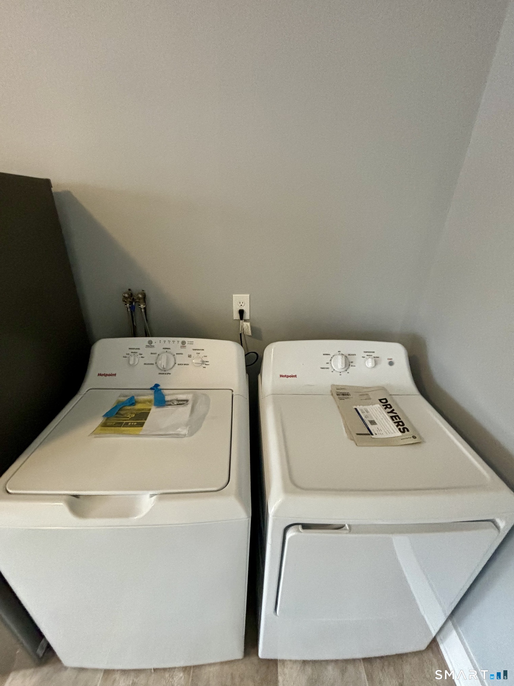 411 Main Street, Unit 1 Cromwell, CT 06416 - Photo 6 of 15 a utility room with dryer and washer