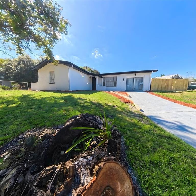 905 Spring Creek Drive Ocoee, FL 34761 - Photo 2 of 43 a backyard of a house