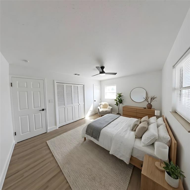 905 Spring Creek Drive Ocoee, FL 34761 - Photo 22 of 35 a bedroom with bed and a window