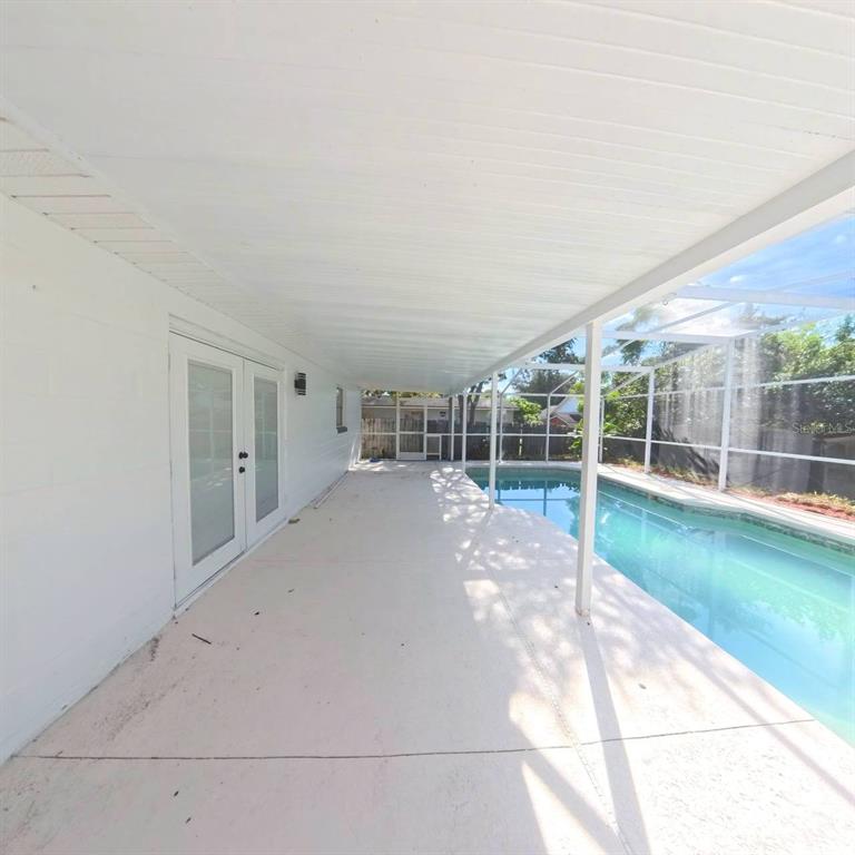 905 Spring Creek Drive Ocoee, FL 34761 - Photo 30 of 35 a view of a house with a backyard