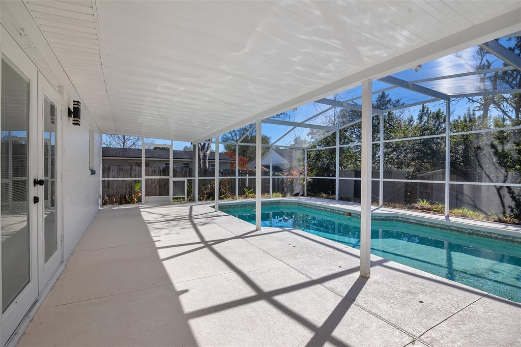 905 Spring Creek Drive Ocoee, FL 34761 - Photo 31 of 35 a view of backyard with staircase