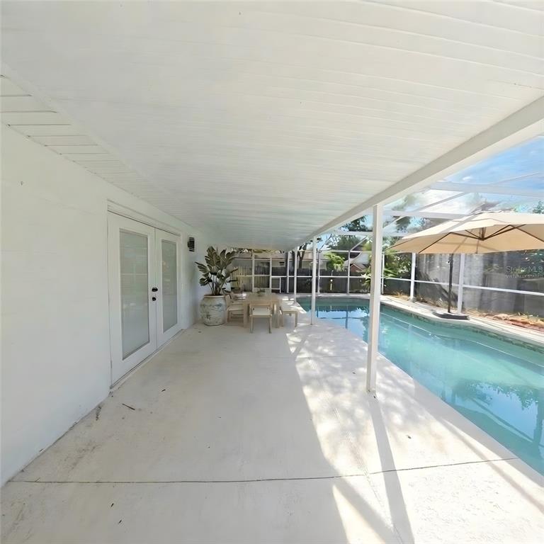 905 Spring Creek Drive Ocoee, FL 34761 - Photo 39 of 43 a view of a house with backyard and porch