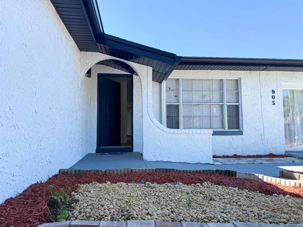 905 Spring Creek Drive Ocoee, FL 34761 - Photo 6 of 43 a view of front door