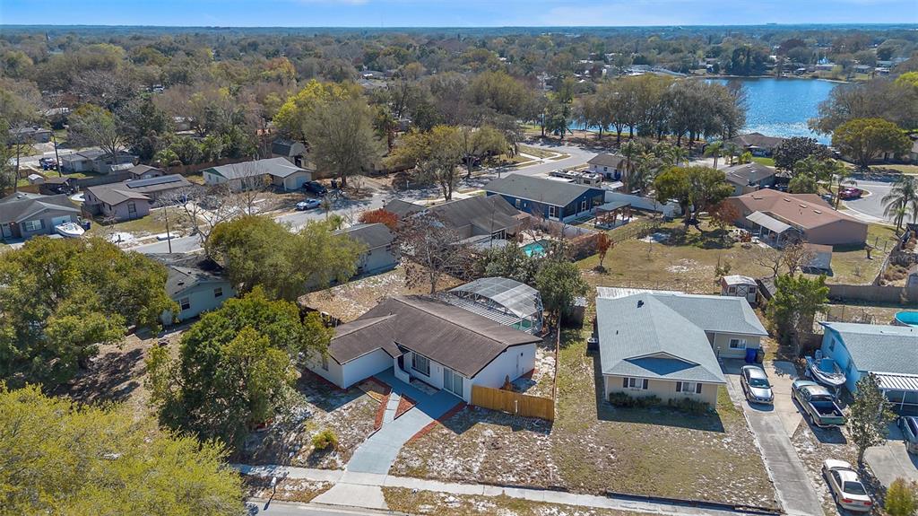 905 Spring Creek Drive Ocoee, FL 34761 - Photo 9 of 35 an aerial view of residential houses with outdoor space
