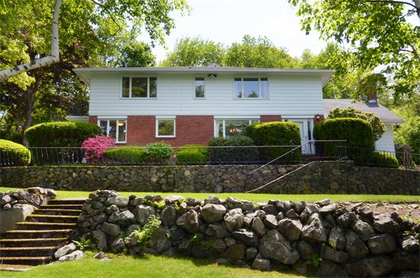 a front view of house with yard