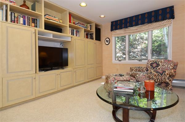 3 Driftwood Road Marblehead, MA 01945 - Photo 11 of 23 a living room with furniture a flat screen tv and a large window