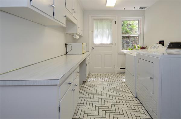 3 Driftwood Road Marblehead, MA 01945 - Photo 13 of 23 a bathroom with a sink a toilet and a window