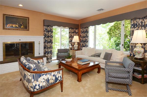 3 Driftwood Road Marblehead, MA 01945 - Photo 15 of 23 a living room with furniture a fireplace and a large window