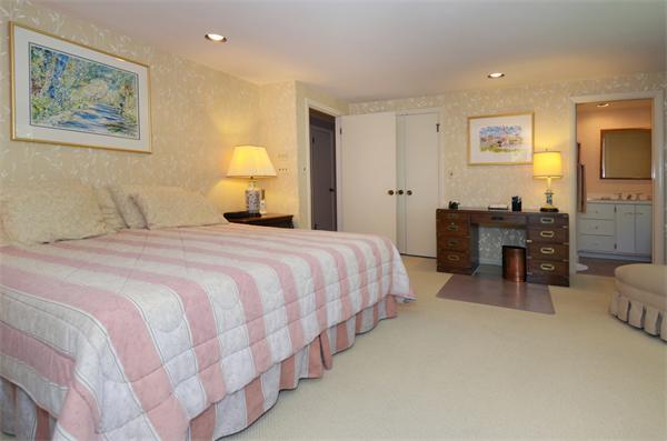 3 Driftwood Road Marblehead, MA 01945 - Photo 18 of 23 a bedroom with a bed and furniture