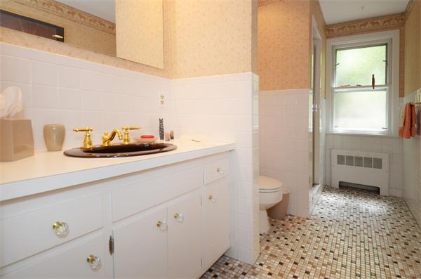3 Driftwood Road Marblehead, MA 01945 - Photo 20 of 23 a bathroom with a sink a toilet and a window