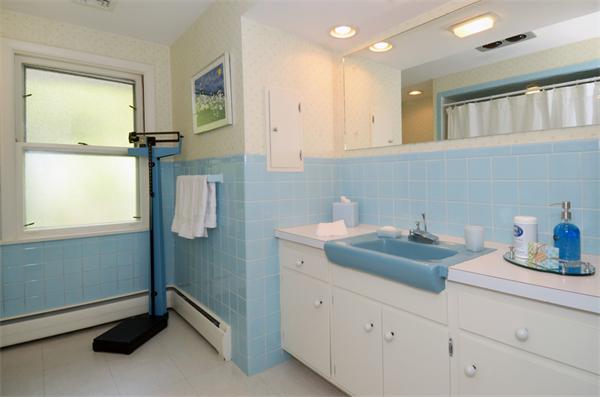 3 Driftwood Road Marblehead, MA 01945 - Photo 21 of 23 a bathroom with a sink and a mirror