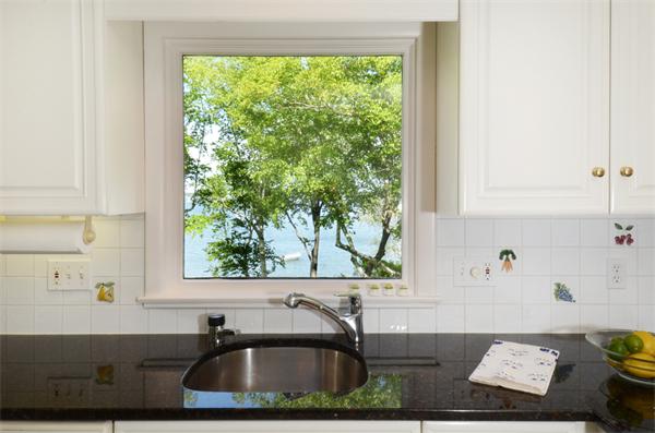 3 Driftwood Road Marblehead, MA 01945 - Photo 10 of 23 a bathroom with a sink and a window