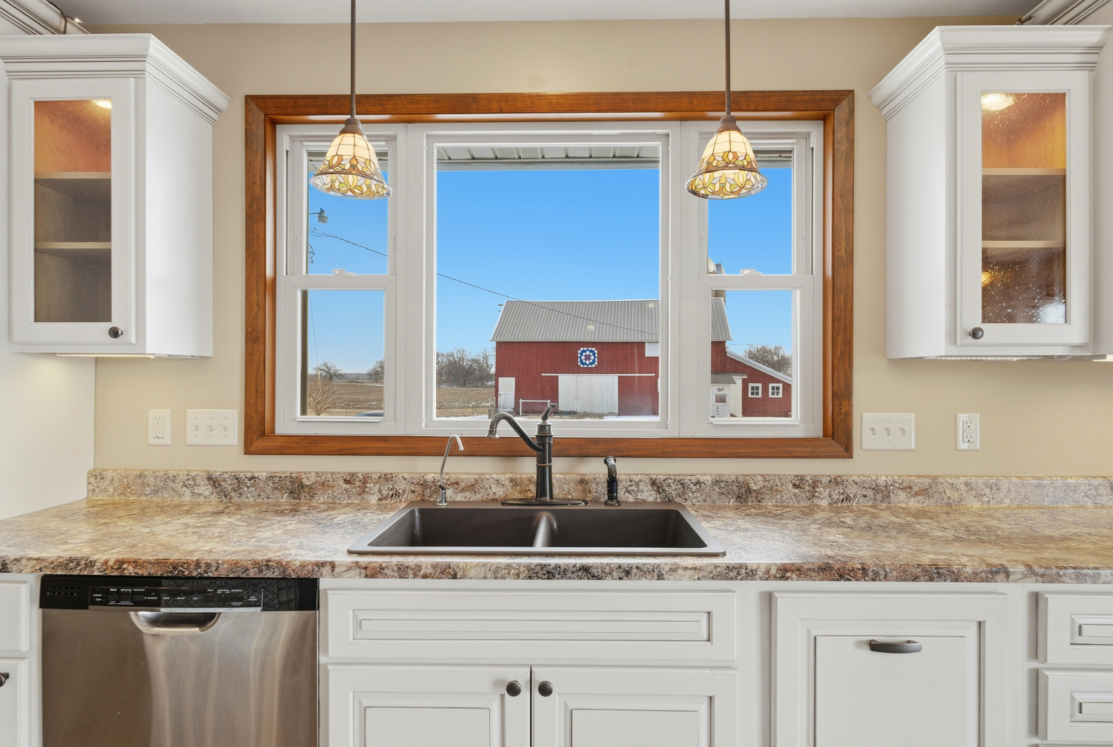 18521 Anderson Road Prophetstown, IL 61277 - Photo 16 of 39 a kitchen with granite countertop a sink and cabinets