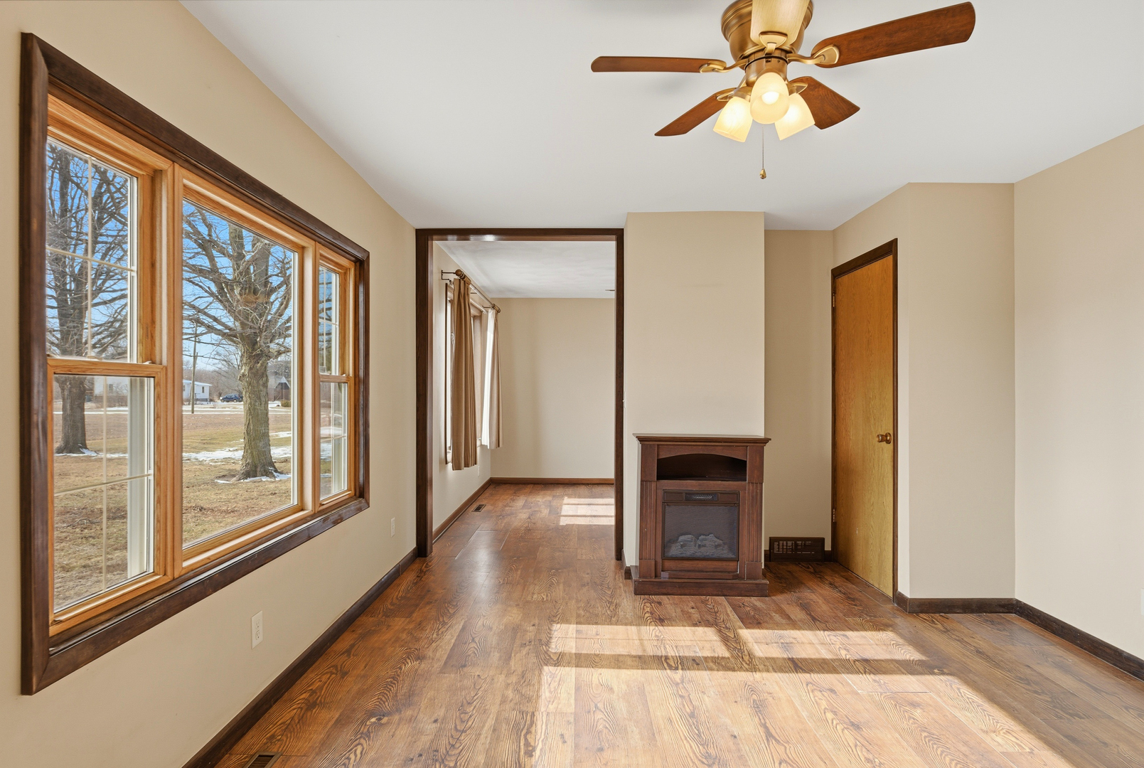 18521 Anderson Road Prophetstown, IL 61277 - Photo 23 of 39 a view of an empty room with a window and a kitchen