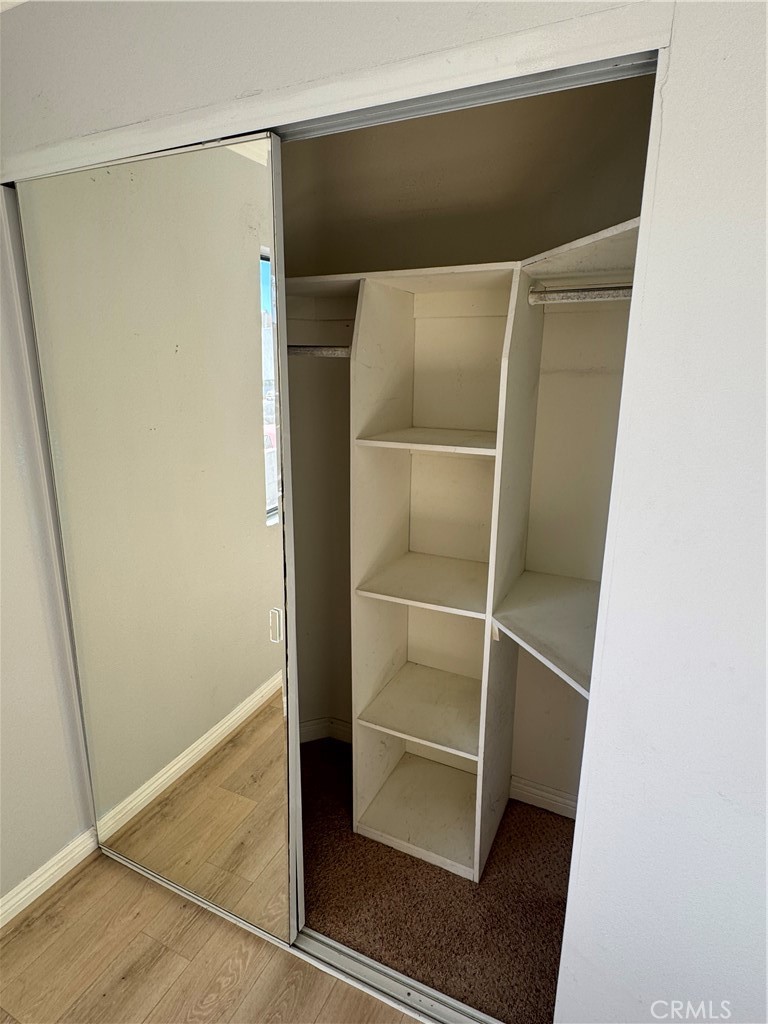 45 Harkness Avenue, Unit 2 Pasadena, CA 91106 - Photo 16 of 26 a view of walk in closet with empty racks