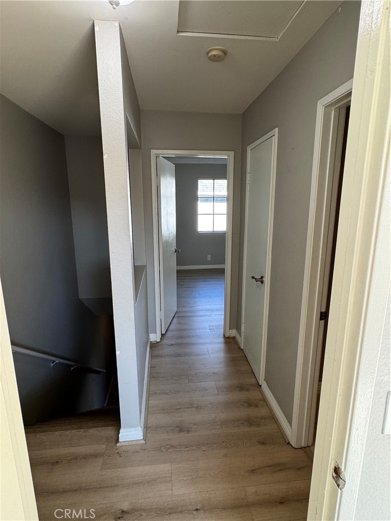 45 Harkness Avenue, Unit 2 Pasadena, CA 91106 - Photo 17 of 26 a view of a hallway view with wooden floor and staircase