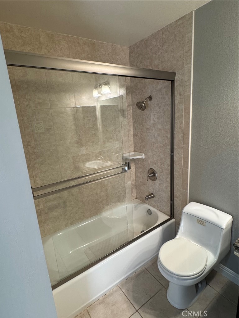 45 Harkness Avenue, Unit 2 Pasadena, CA 91106 - Photo 18 of 26 a bathroom with a shower and a toilet