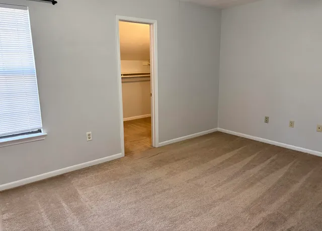 an empty room with a door