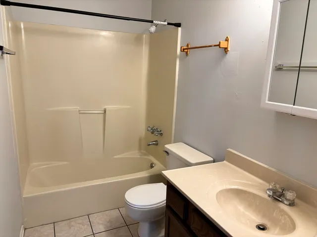 a bathroom with a sink and a bathtub