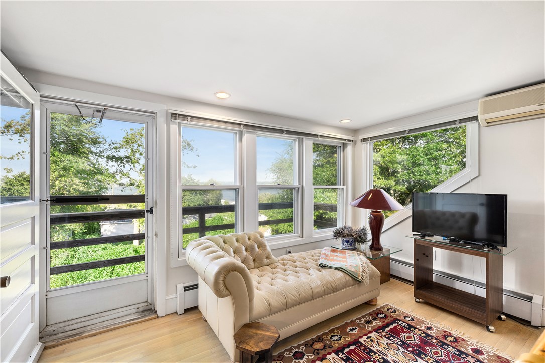 25 Carey Lane Little Compton, RI 02837 - Photo 30 of 49 Primary Suite seating area, egress to Juliet balcony
