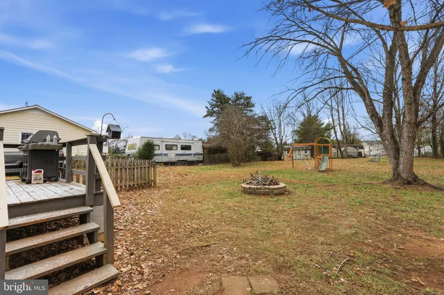 a view of a swimming pool with an outdoor space