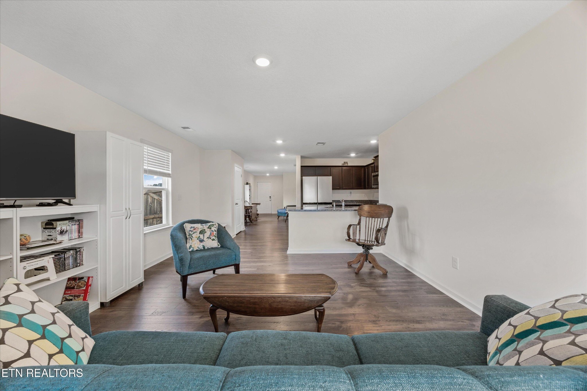 248 Belle Court Talbott, TN 37877 - Photo 15 of 36 a living room with furniture and a flat screen tv