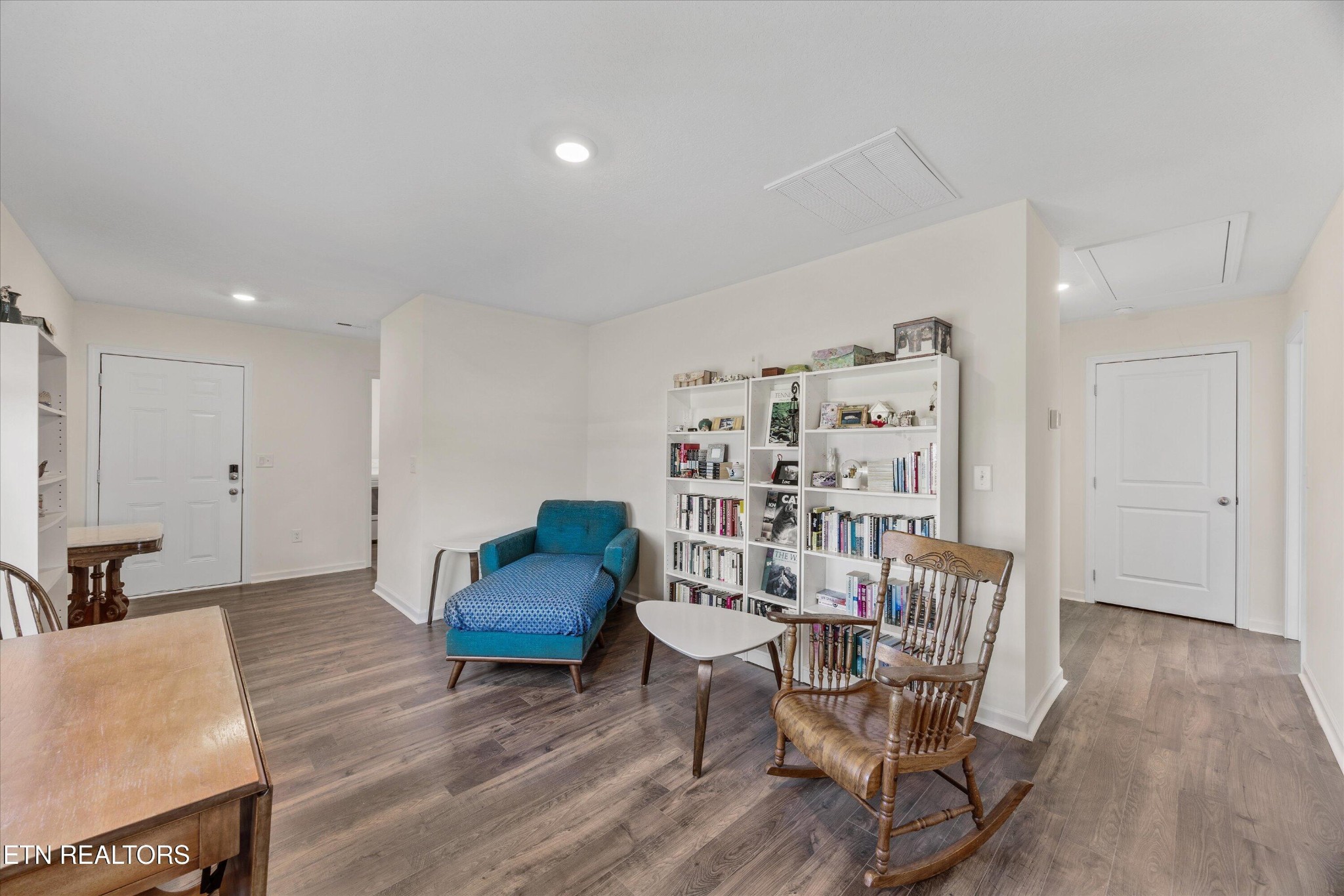248 Belle Court Talbott, TN 37877 - Photo 6 of 36 a living room with furniture and a wooden floor