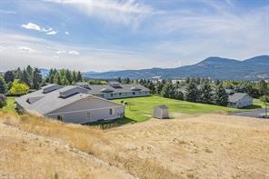 542 South Summit Street Colville, WA 99114 - Photo 7 of 10 a view of a house with a yard and a large tree