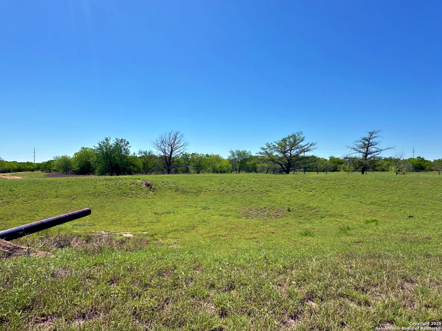 3265 Highway 97 Jourdanton, TX 78026 - Photo 10 of 24 a view of a lake with a big yard