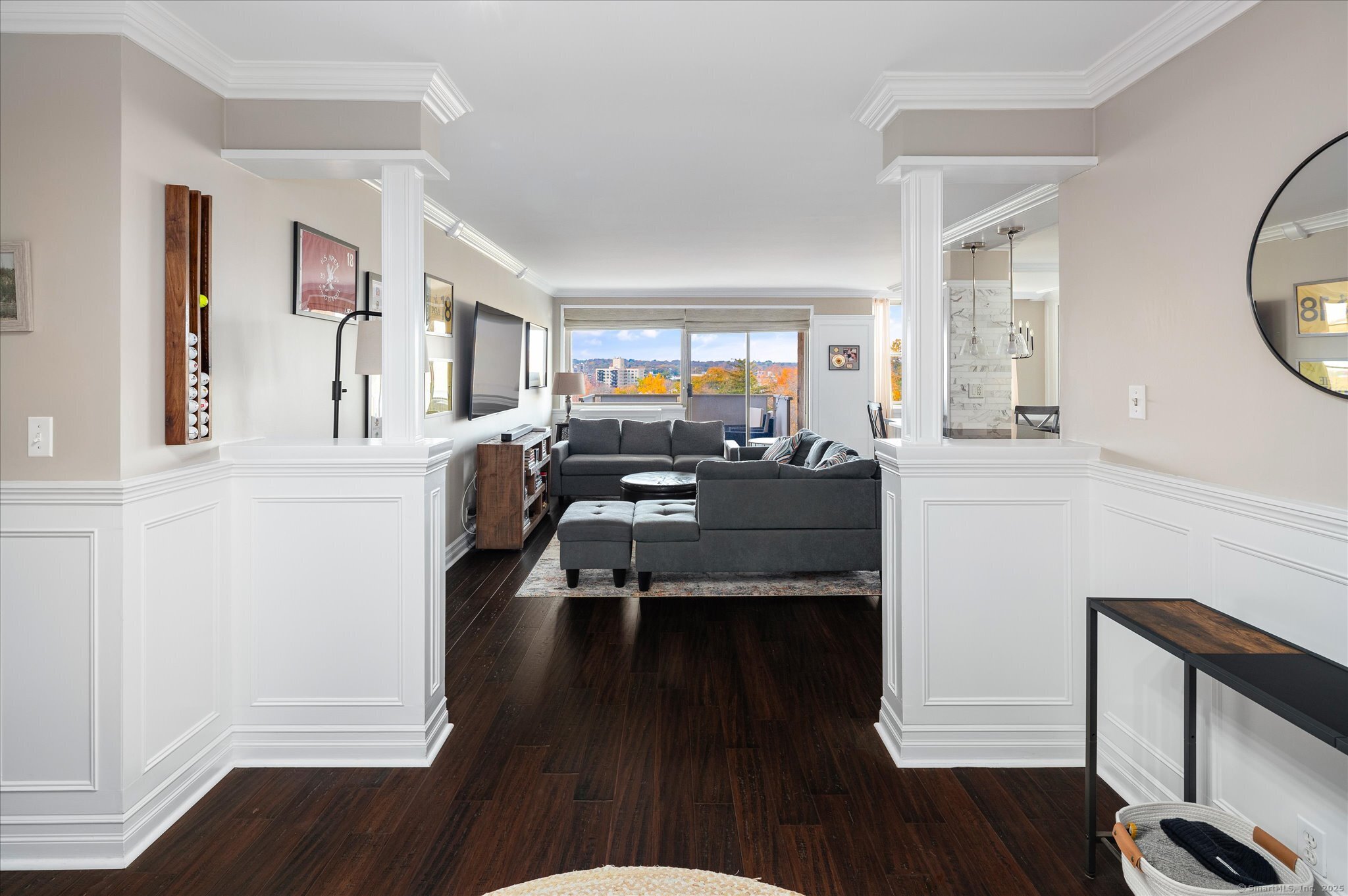 50 Glenbrook Road, Unit 9F Stamford, CT 06902 - Photo 1 of 1 a living room with furniture and a wooden floor