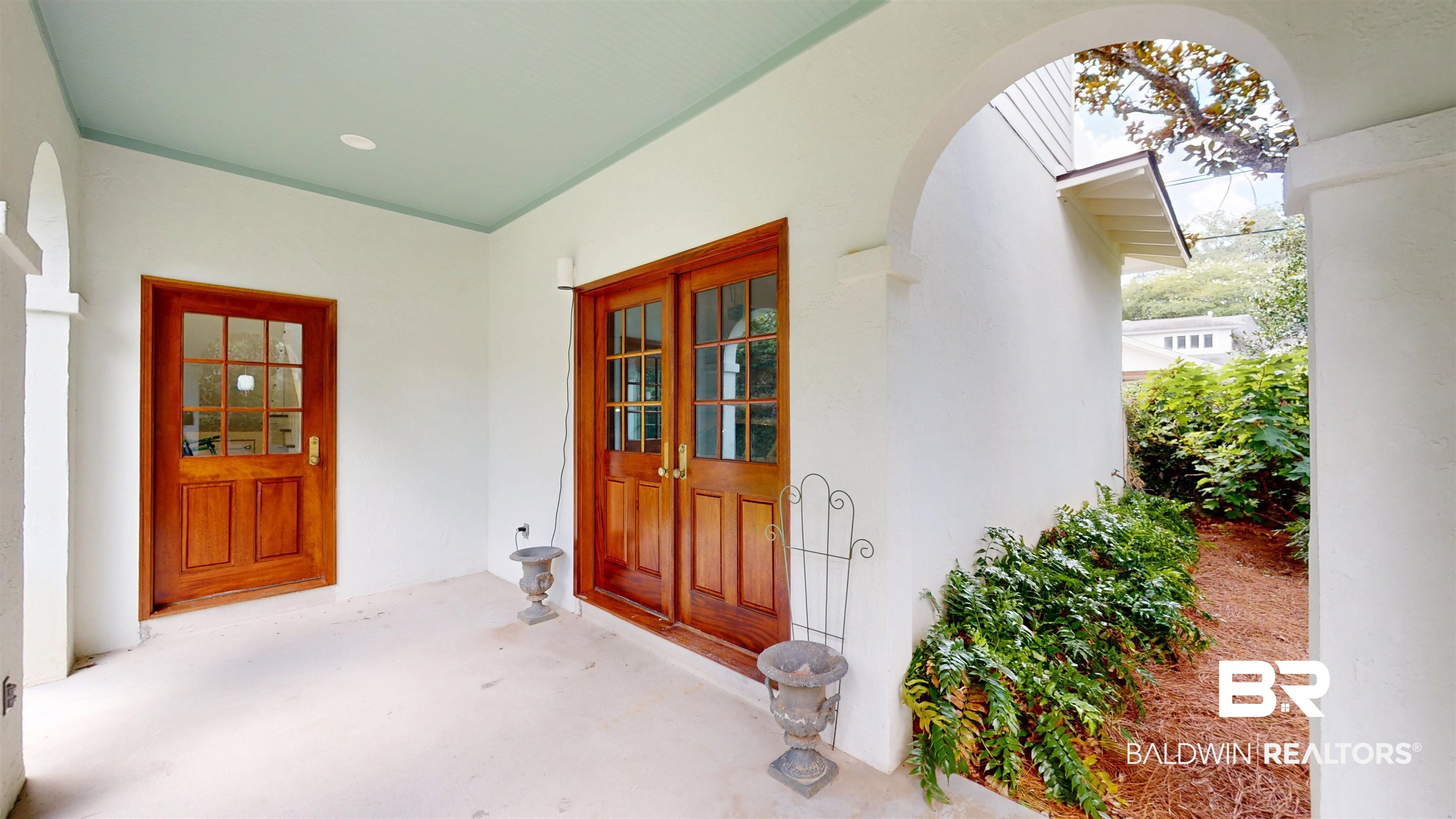 211 Lanier Avenue Mobile, AL 36607 - Photo 64 of 73 Property entrance with stucco siding