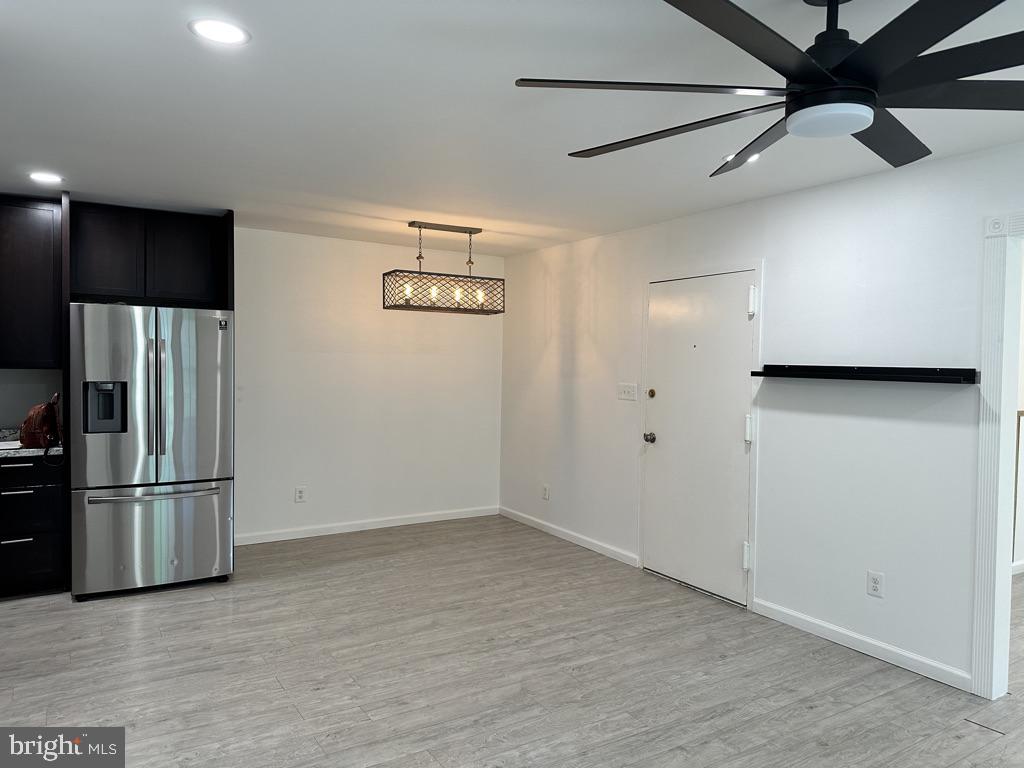 5900 Prince George Drive, Unit 333 Springfield, VA 22152 - Photo 11 of 41 Dining Area with modern chandelier
