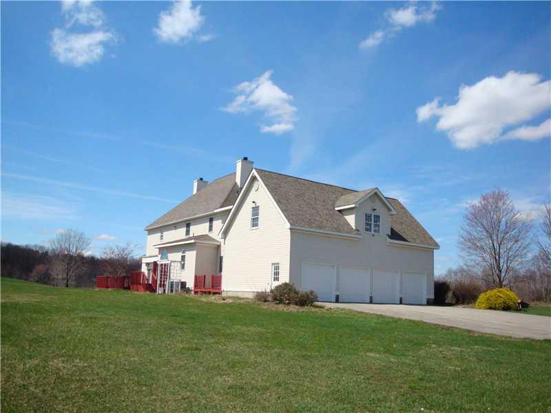 217 Pflugh Road Butler, PA 16001 - Photo 6 of 25 Parking Lot/Garage. 4 garage stalls with brand new garage doors!