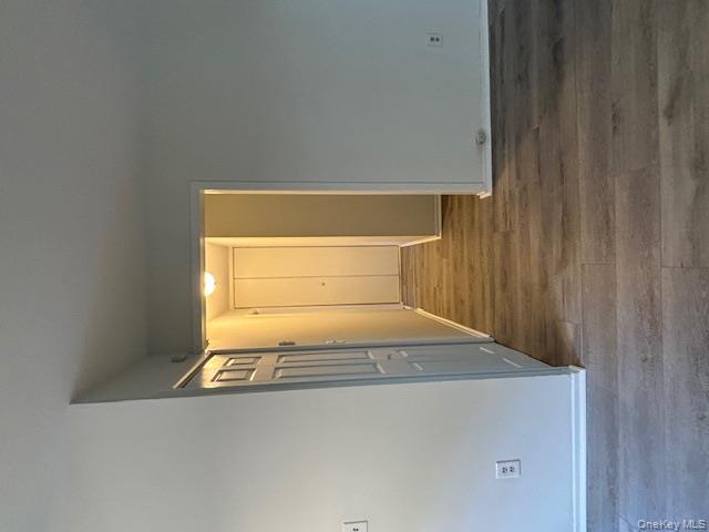 31 C Alpine Drive Wappingers Falls, NY 12590 - Photo 11 of 19 a view of a hallway with wooden floor
