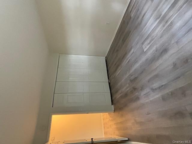 31 C Alpine Drive Wappingers Falls, NY 12590 - Photo 13 of 19 a view of empty room with wooden floor and fan