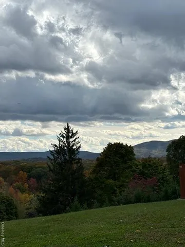 a view of lake with mountain