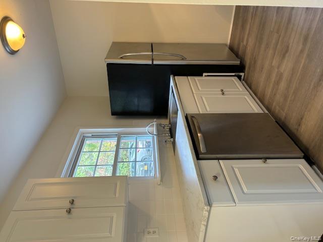 31 C Alpine Drive Wappingers Falls, NY 12590 - Photo 7 of 19 a kitchen with a microwave and a sink