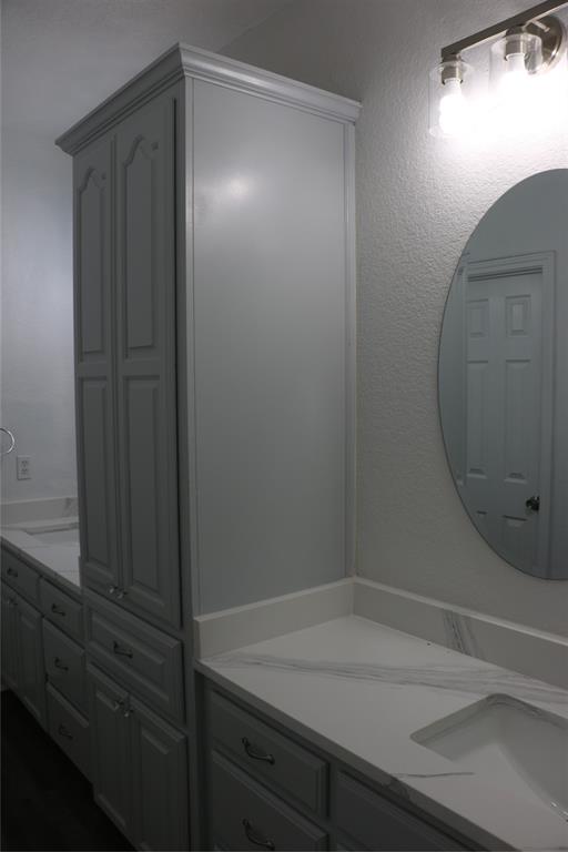 2858 Waters Edge Quinlan, TX 75474 - Photo 22 of 34 a bathroom with a shower and vanity