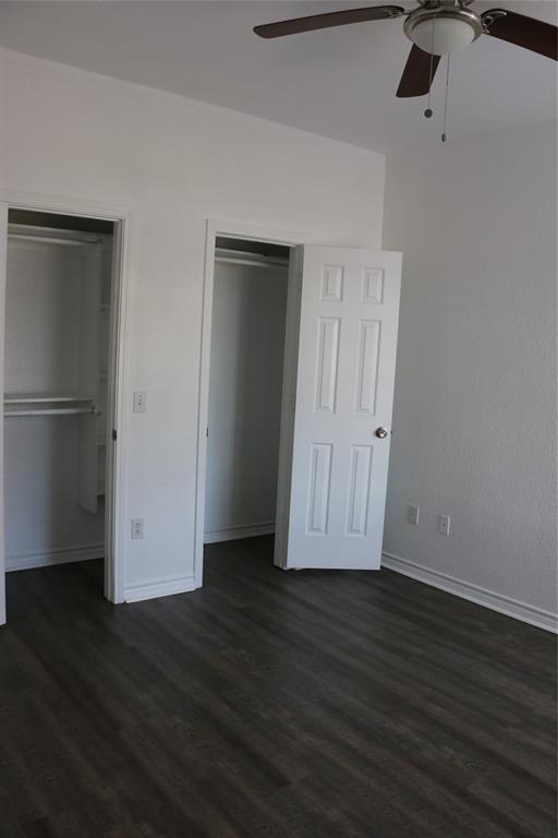 2858 Waters Edge Quinlan, TX 75474 - Photo 23 of 34 a view of an empty room with wooden floor